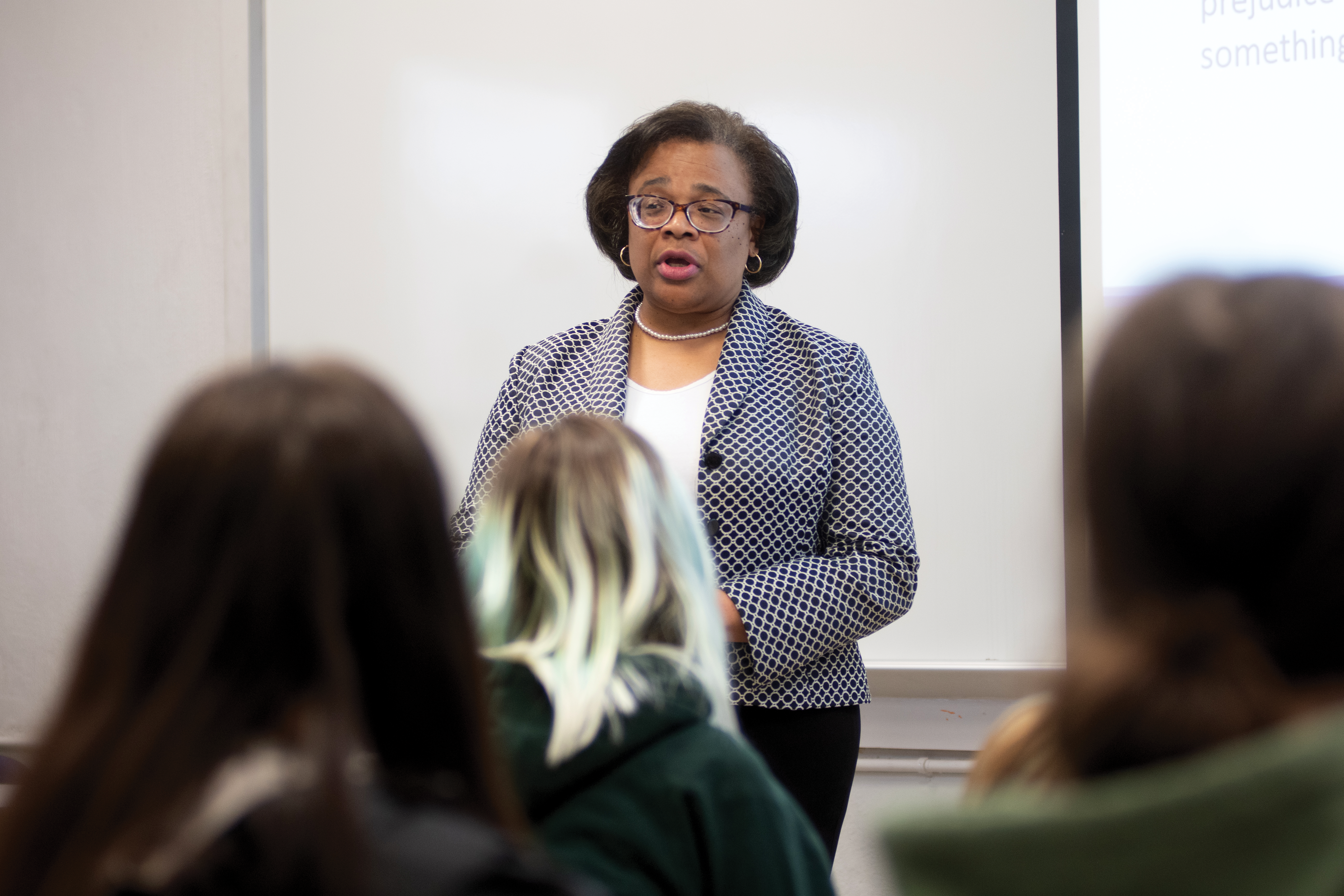 Zelia speaking to class