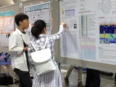 Miao explains poster