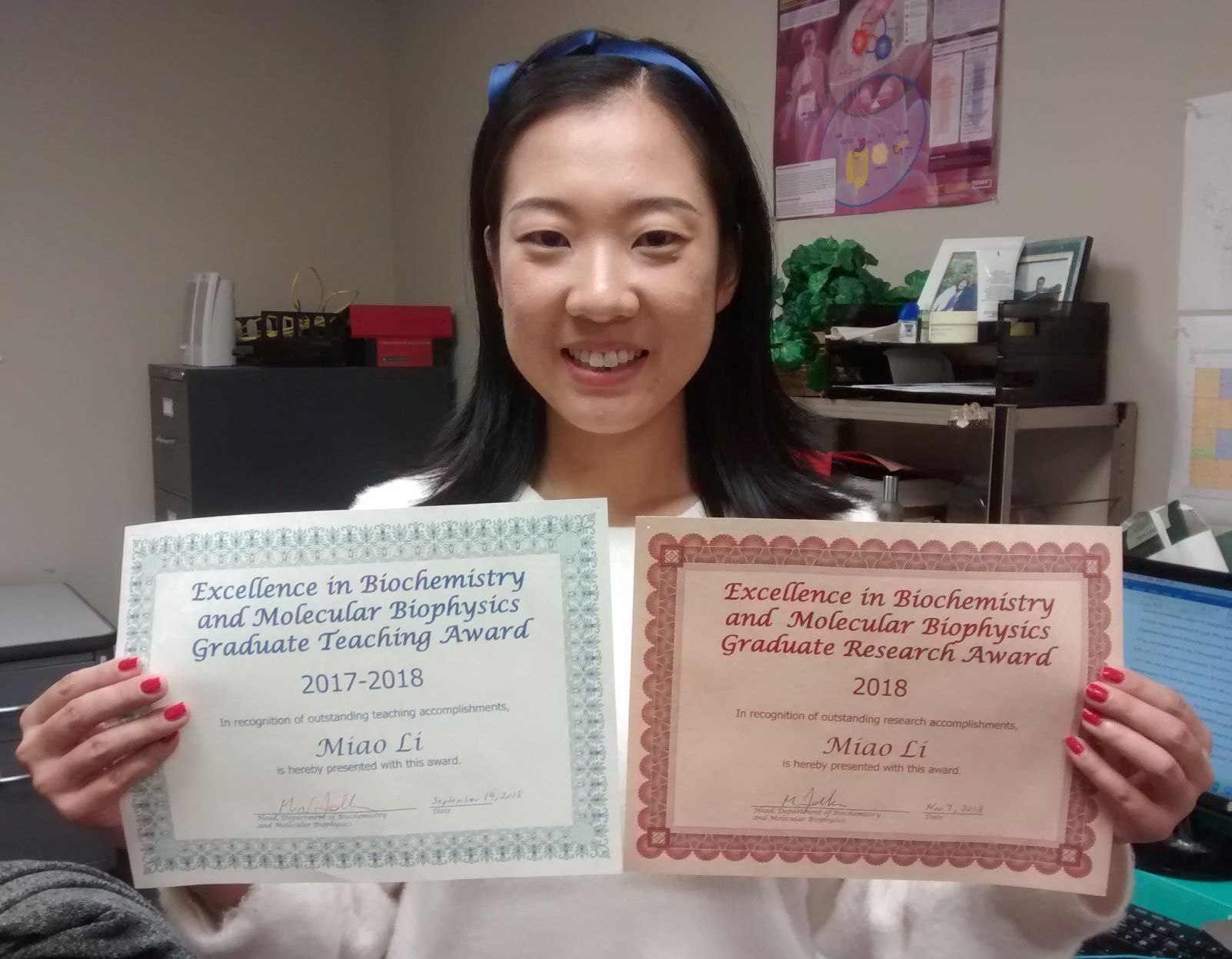 Miao with two awards