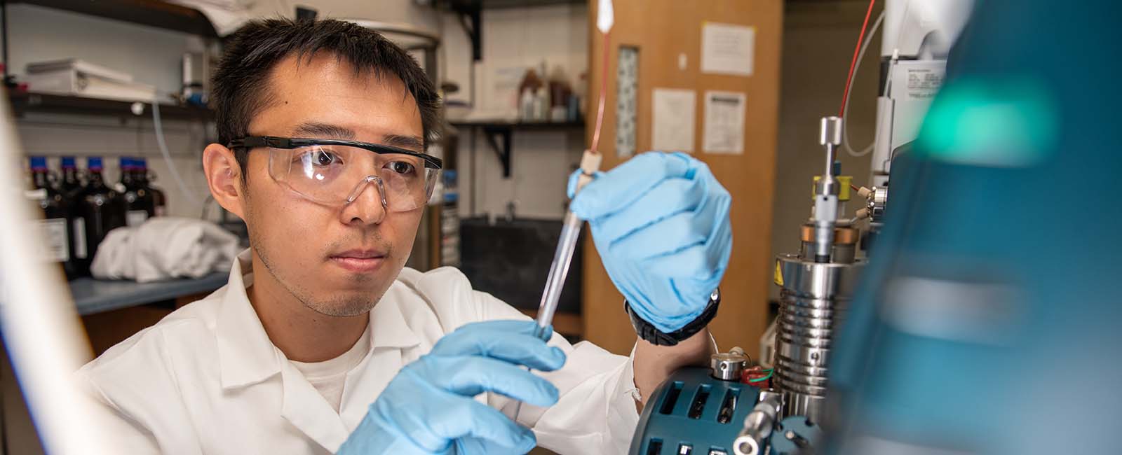 Student in biochemistry lab