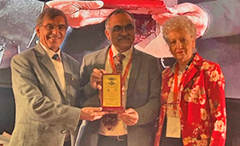 Dr. Om Prakash receives appreciation award for consulting.