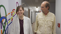 Image of Dr. Tomich with student and link to Dr. Tomich's YouTube research video