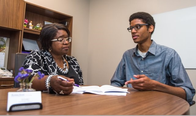 Student meeting with advisor