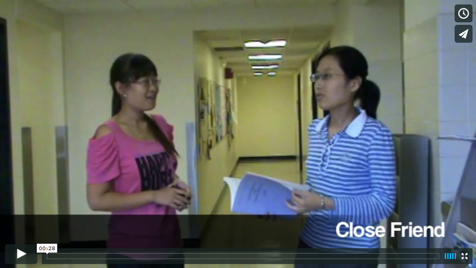 This shows a screen grab from a video of two young women interacting.