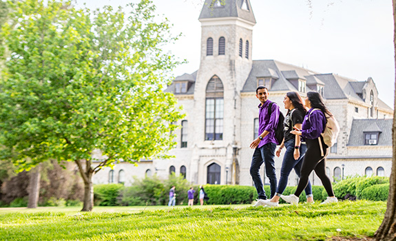 Students walking in front of Anderson Hall on campus