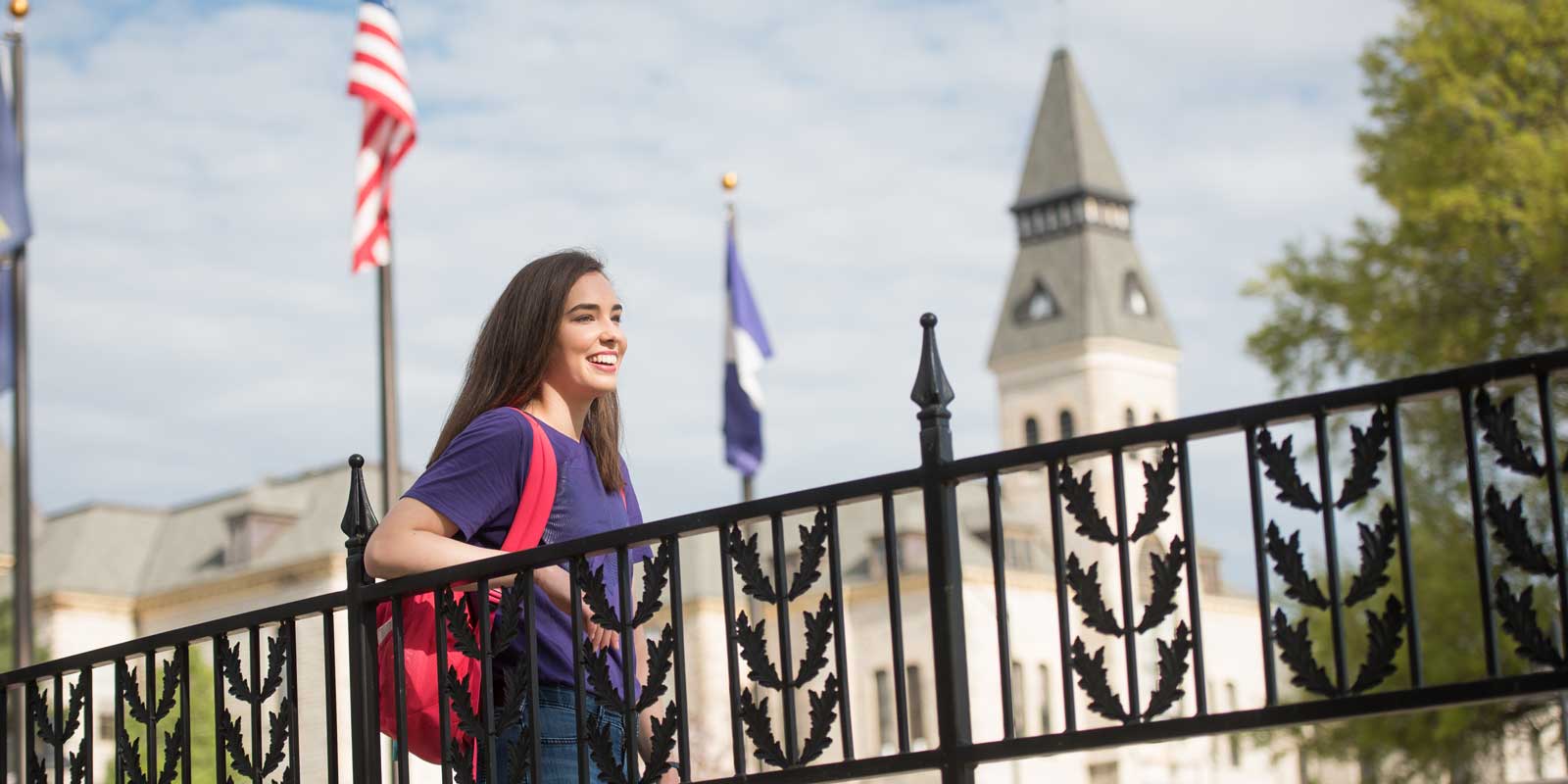 Student in front of Anderson Hall.