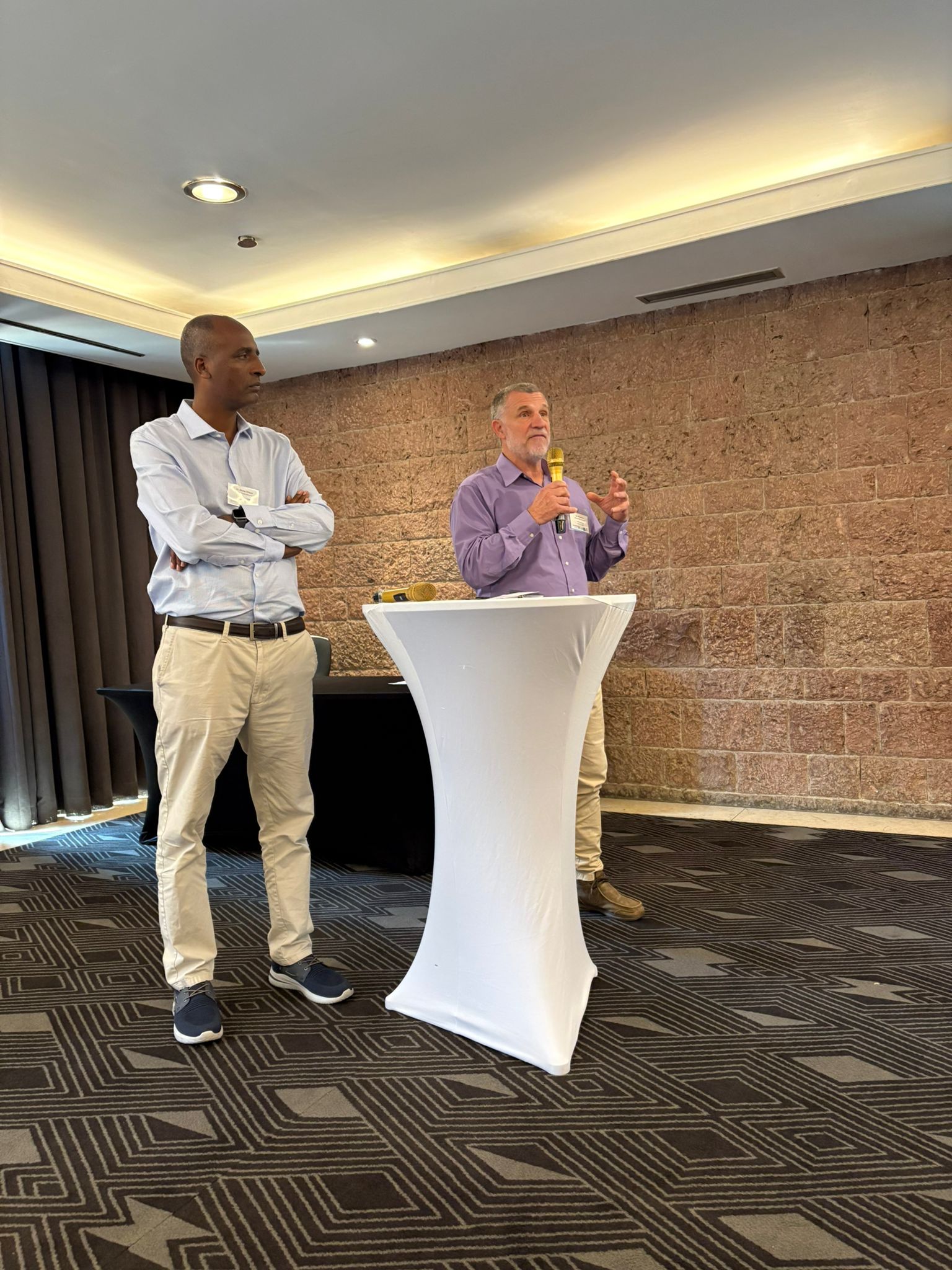 Nat and Alemu presenting in Ethiopia