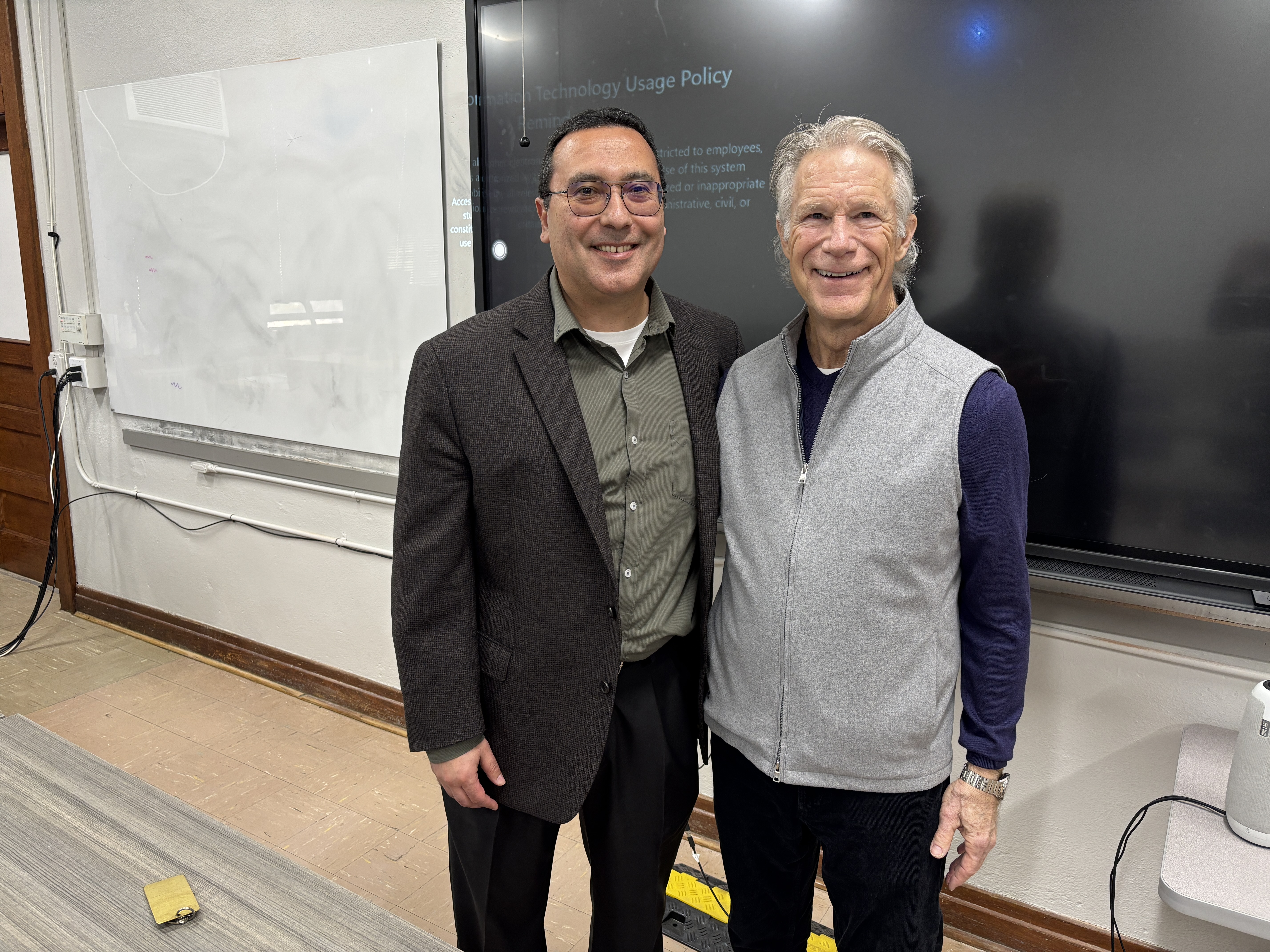 Two men with smiles