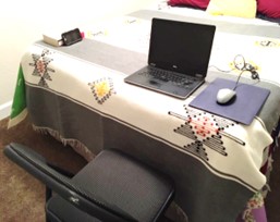 A laptop and a cellphone in a room for testing