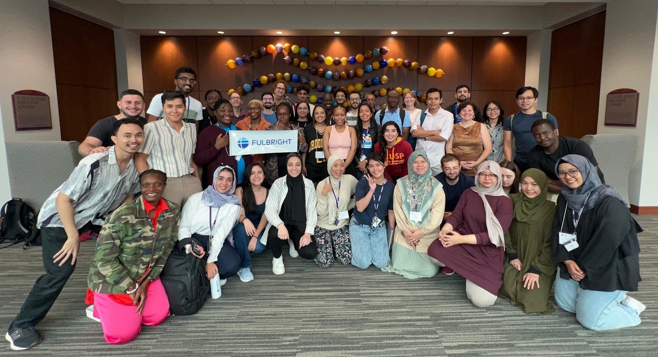 Fulbright scholars attending closing even