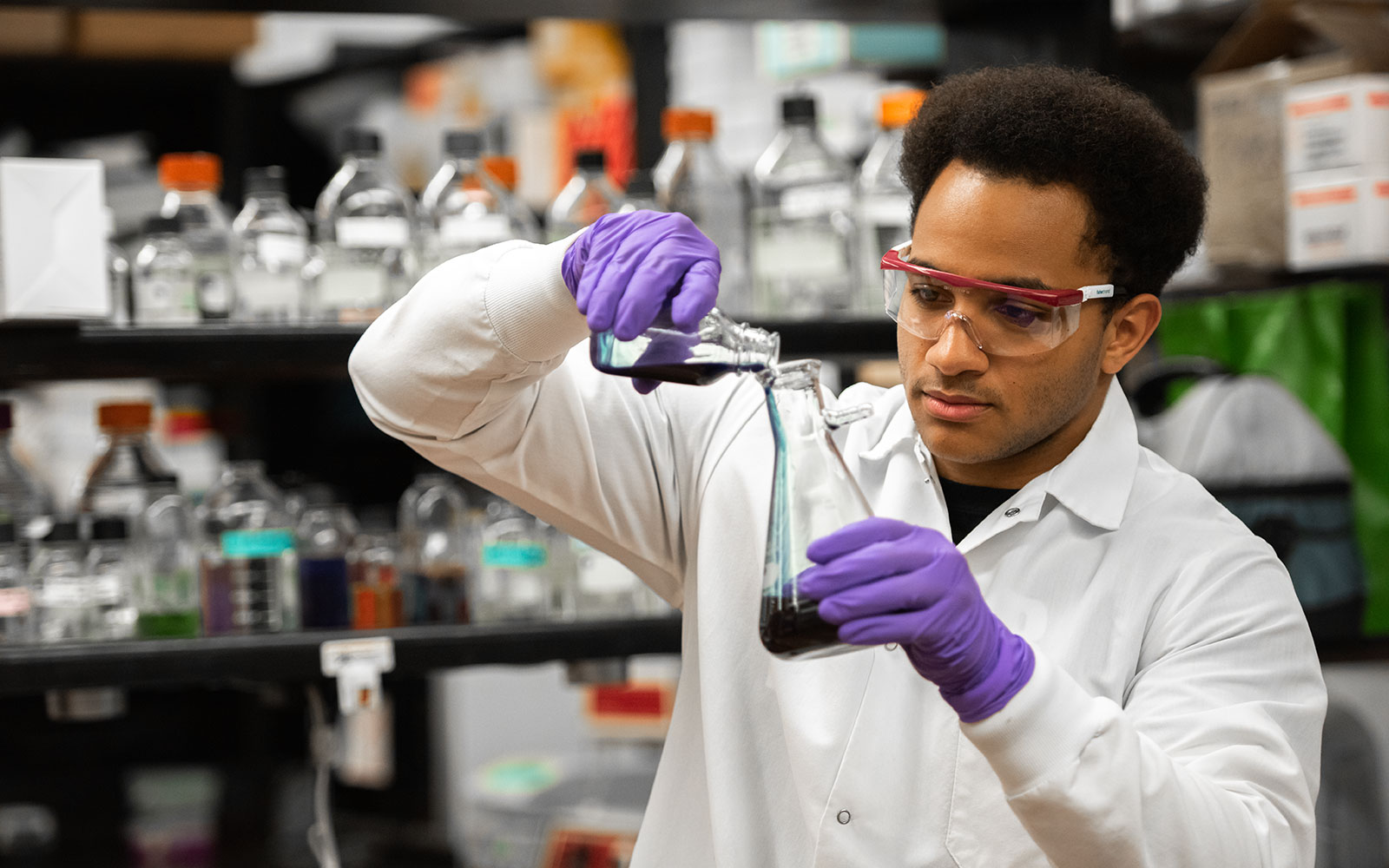 This image shows a researcher working in a laboratory.