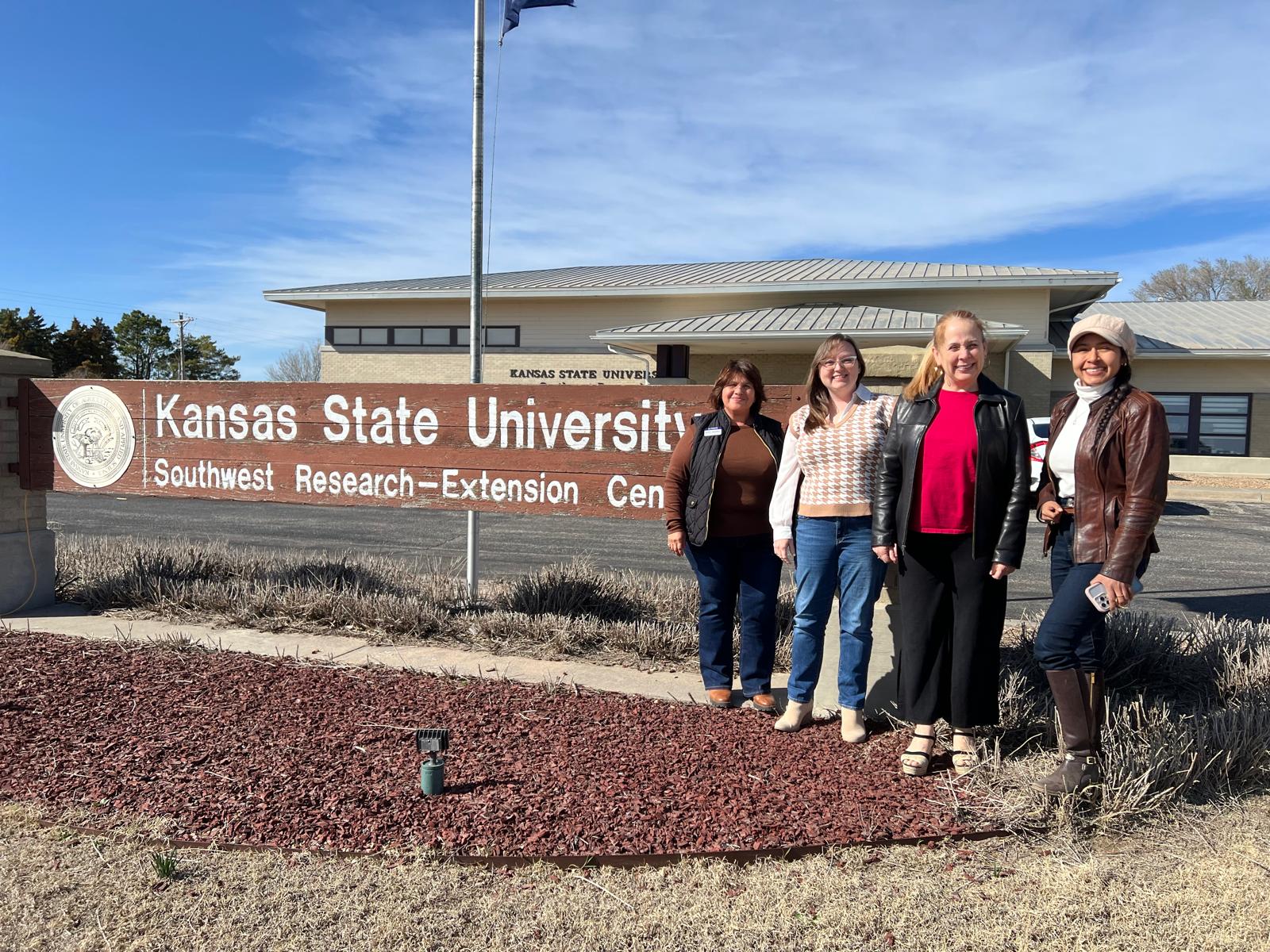 The four-person research team poses in front of the SWREC