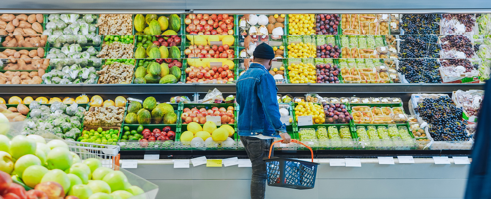 Photo of a man shopping for fruit and vegetables