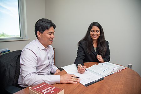 pair discussing at desk