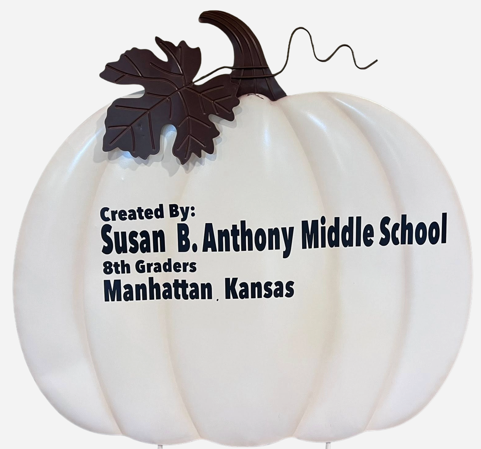 white metal pumpkin sign for susan b anthony middle school 