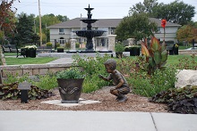 dragonfly boy with urn