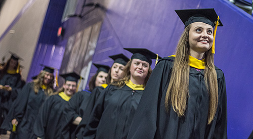 Graduates waiting to walk into ceremony