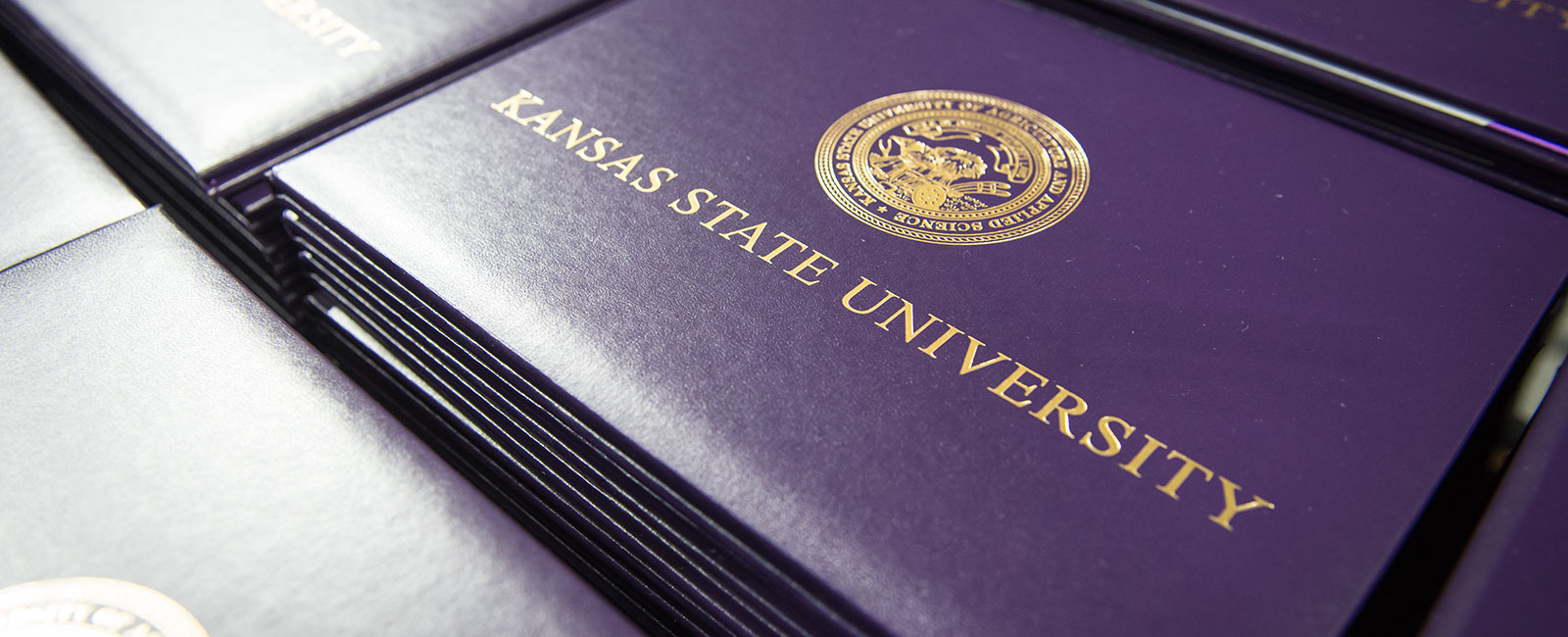 Kansas State University purple diploma covers