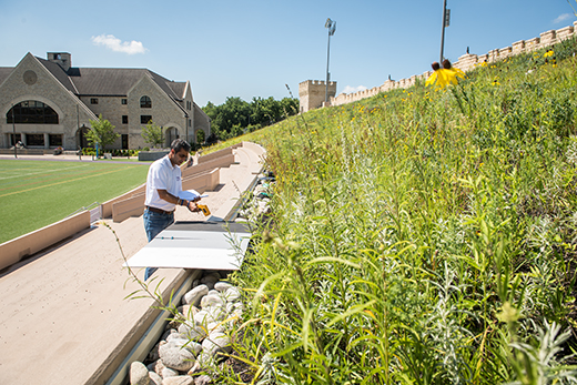 Dr. Sharda taking ground control points on west stadium