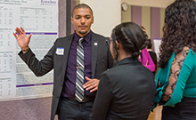 Student presenting research on campus