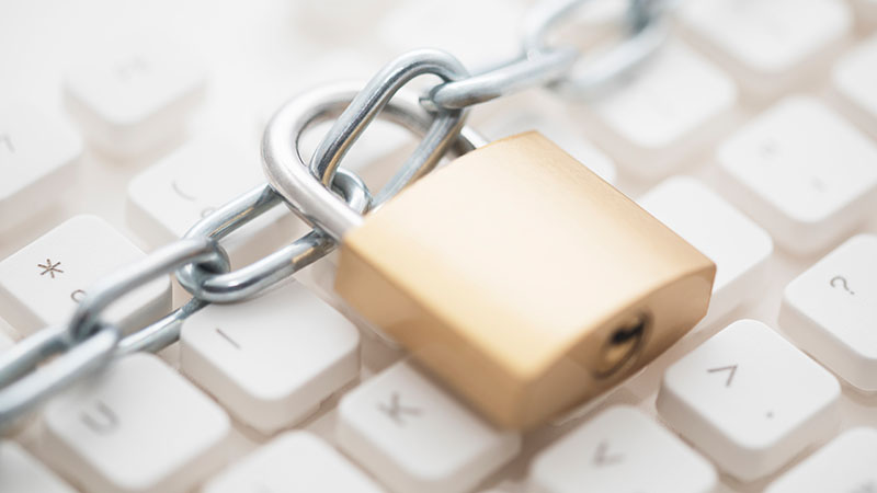 Keyboard with lock and chain across it