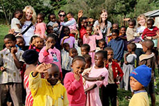 Allegra Gigstad surrounded by children