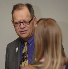 Mize visits with a student (photo by Dan Donnert)