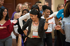 Madai Rivera dancing at the Tilford conference