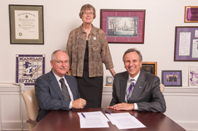 Pat Bosco, Kansas State University's vice president for student life and dean of students, and Duane Dunn, president of Seward County Community College, signed the reverse transfer agreement.