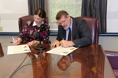 Provost April Mason and Daryl Buchholz, associate director for extension and applied research, signed a proclamation celebrating the 100th anniversary of the Cooperative Extension Service and signing of the Smith-Lever Act.