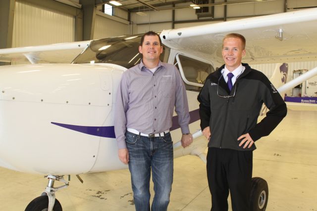Kansas State University Salina alumnus Nathan Gorrell, left, and professional pilot junior Taylor Spangler fly a K-State Cessna 172 in the Fly Kansas Air Tour.