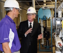 One of the sites where John Gamble (right) will provide environmental health and safety guidance is the O.H. Kruse Feed Technology Innovation Center, and he is pictured here with Charles Stark, faculty member, Department of Grain Science and Industry.