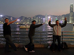 K-S-U in front of the Hong Kong skyline