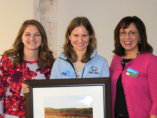 Anna Zahner receives award from (from left) Hallie Hatfield and Jill Haukos of the Konza Environmental Education Program