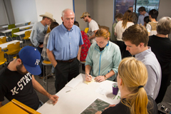 Major (Ret) Gary LaGrange observes students during Wounded Warrior Charrette