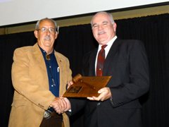 Outgoing president, Glen Haubold honoring incoming president Ed Heptig in the passing of the gavel ceremony.