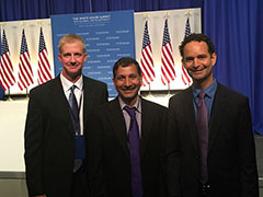 From left: Jesse Poland, Vara Prasad and Jagger Harvey recently attended the White House Summit on Global Development.