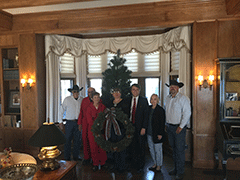 Cecil Carter, 3C Carriage Service; Jerry and Marlene Eck, Bel Tree Farm; Chris Seets, Chris’ Tree Lodge; Lieutenant Governor Jeff Colyer, Celia Goering, Kansas Christmas Tree Growers Association president; and Robert Carter, also of 3C Carriage Service