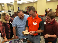 Tom Vontz with social studies teachers review "The Federalist."