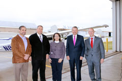 Pictured, from left, is Kurt Barnhart, associate dean of research, Eric Shappee, aviation professor and director of flight ops, Dean Verna Fitzsimmons, Richard Carlson, Kansas secretary of transportation, and Merrill Atwater, KDOT director of aviation.