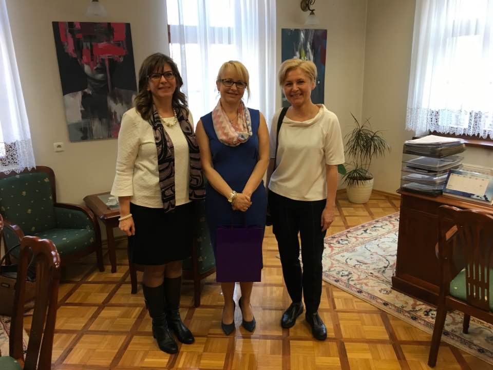 Susan Yelich Biniecki (left) and Marzanna Pogorzelska (right) pose for a photo after a presentation.