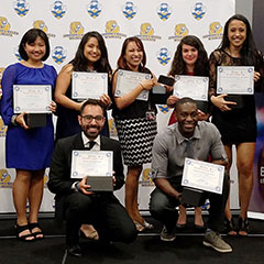 K-State MBA student Chris Nettey (bottom right), accepting the first place award with the rest of his X-Culture team.