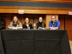 Undergraduate tutors Jessica Cotter, Kristin Feezor, Margaret Lang, and Emily Moore presenting at IWCA.