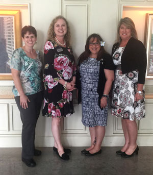 Resilience Award winners, Karen Cunningham; Institute director, Briana Goff; Roberta Hanlon and Christine Benne.