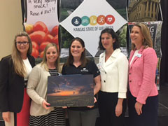Rawlins County Extension Agents JoEllyn Argabright and Emily Green accept the 2017 Organization Health Champion award 