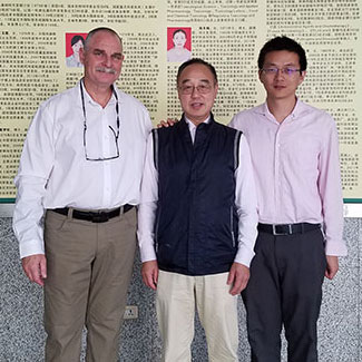 Dr. Zhoumeng Lin (right) with Dr. Eran Lavy and Zonghui Yuan in Wohan, China.