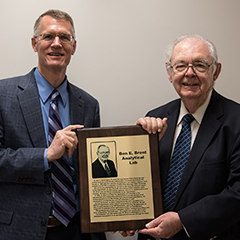 The KSU ASI Analytical Lab was recently renamed the Ben E. Brent Analytical Lab. Pictured with Dr. Brent (right) is Dr. Evan Titgemeyer, K-State Animal Sciences and Industry interim department head.