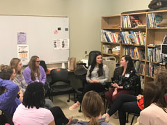 Teachers and administrators from Liberal, Kansas, visit with future teachers in Kaylee Myers' class.