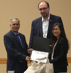 Tuyen Nguyen received the award from Prof. Ram I. Mahato (Chair of Pharmaceutical Sciences, UNMC) and Prof. David Oupicky (Co-Director of the Center for Drug Delivery and Nanomedicine, UNMC)