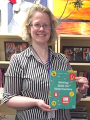 Ryane Englar poses with her latest published book